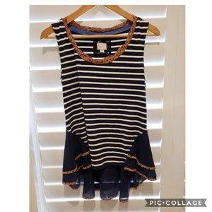 Blue and white striped sleeveless top.